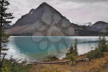 Mountain of the correct pyramidal form in northern Canada, reflected in lake