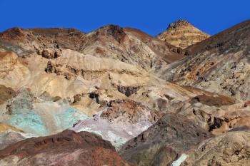 Multi-colored rocks in Death Valley. The famous road Artists Palette