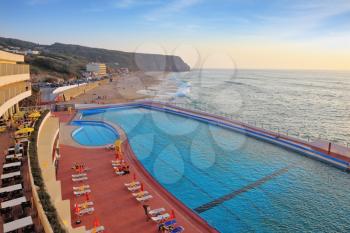 A huge beautiful pool on the beach. Atlantic coast, the Portuguese resort of Sintra, a prestigious hotel