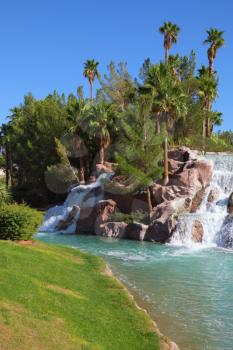 Oasis in desert. Magnificent cascade falls in the tourist centre