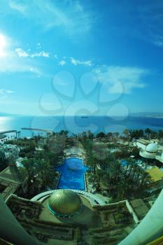 Swimming pool on coast of Red sea, photographed from a window of magnificent hotel