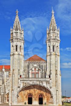 Two slender towers topped by crosses.  The main attraction of Lisbon - Jeronimos monastery on the bank of the River Tagus. 