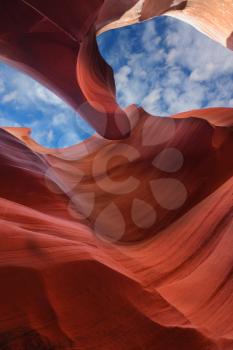 Stone waves and cloudy sky. The Magic Antelope Canyon in the Navajo Reservation, the United States.
