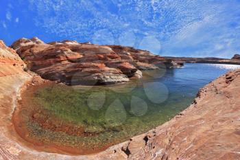Turquoise water in the red desert. Flood of the artificial lake Powell photographed Fisheye lens