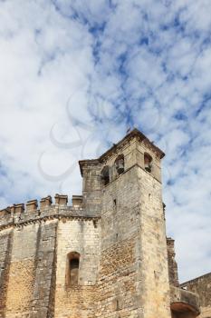 The imposing medieval castle - the monastery of the Templars. Powerful round tower and bell tower