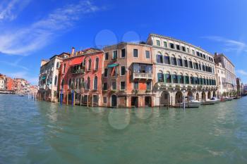 Great photo Venetian palazzo surrounded mirrored waters channel. Photo making the lens Fisheye