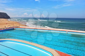 A huge beautiful pool on the beach. Atlantic coast, the Portuguese resort of Sintra, a prestigious hotel