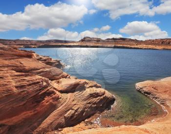  Bottling magnificent Lake Powell photographed by Fisheye lens.  The midday sun in the turquoise water bay