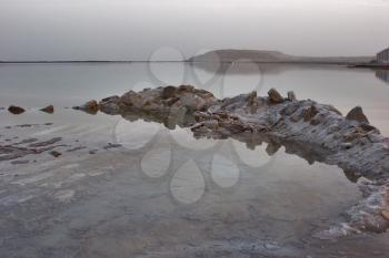 A stone in the shoaled salty Dead Sea
