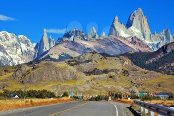 Excellent highway in Patagonia.  Famous rock Fitz Roy peaks in the Andes. 