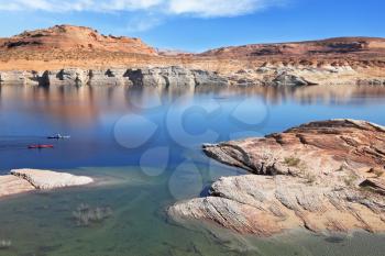 The blue and turquoise water in the desert rock. Bottling magnificent Lake Powell photographed by Fisheye lens