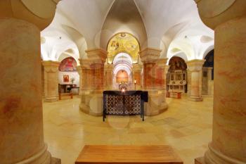 Interior of church Dormitsion with columns and a statue of Sacred  Maria