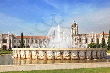 Gorgeous Portugal. Embankment of the River Tagus in Lisbon. A beautiful fountain and a huge monastery of St. Jerome