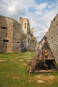 Battering-ram in a dilapidated medieval citadel