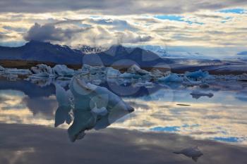 South-east Iceland in July. Icebergs and ice floes in the blue Ice lagoon Jokulsarlon
