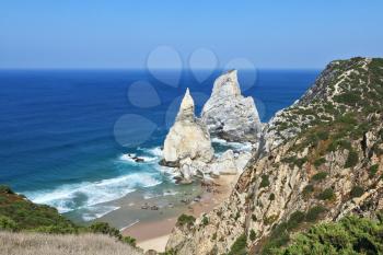 The picturesque, bizarre rocks on the shore of the Atlantic Ocean. Coast of Portugal, Cabo da Roca
