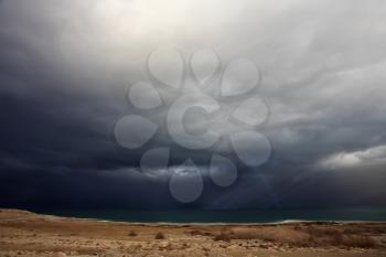 Huge thundercloud above an autumn field in state of Montana