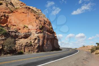 California. The Magnificent American roads in the red rock desert. Rocks and stones