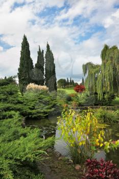 Fabulously beautiful park-garden Sigurta. Ornamental pond and colorful flowers and trees