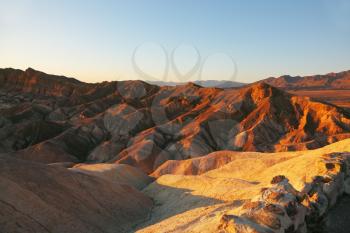 Pink sunset in Death Valley. Famous Zabriskie - Point