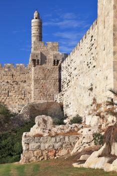 The walls of the eternal Jerusalem. The sunset gently illuminates the ancient walls and Tower of David