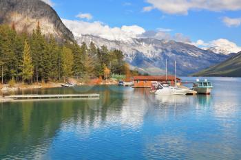 Harbour, a hangar for two boats and motorboats. Quiet shallow lake in Banff National Park in Canada. Sunset