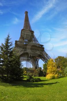 Travel Paris. Park at the foot of the Eiffel Tower. Unexpected angle Fisheye lens takes