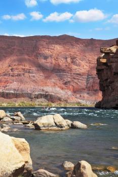 Sharp of the Colorado River. The rapid flow of the river among the stone sills