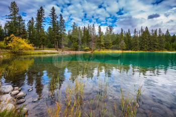  Canadian Rocky Mountains, Jasper National Park. The picturesque oval lake with clear water