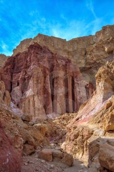 Gorge in the dry mountains of Eilat and natural Amram pillars of pink sandstone. Warm January day