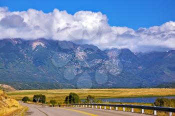  The longest road the Ruta 40 passes in Argentina among lakes and fields. The picturesque mountain chain of the Southern Andes decorates a landscape.  Patagonia