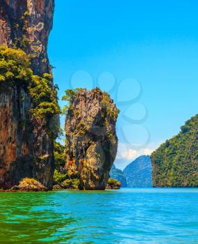The tourist season in Thailand. Calm and warm sea and picturesque quaint island. James Bond Island