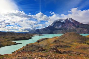  National Park Torres del Paine, Patagonia, Chile.  Emerald waters of Lake Pehoe at rocks Los Kuernos