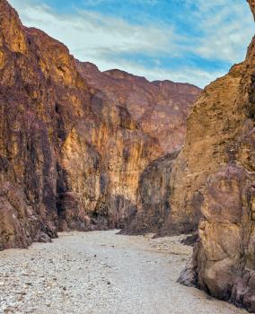 Multicolor and picturesque Black canyon in ancient mountains of Eilat. Israel in January