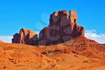 The unique red sandstone cliffs - camel. Red Desert Navajo reservation in the USA