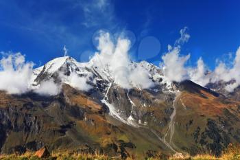 Snow-capped Alps in beautiful autumn day.