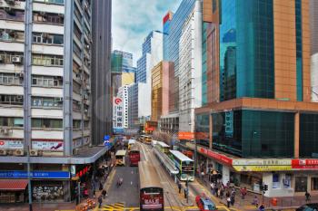 HONG KONG - DECEMBER 11, 2014: Hong Kong Special Administrative Region, China. Ultra-modern skyscrapers and narrow streets between them