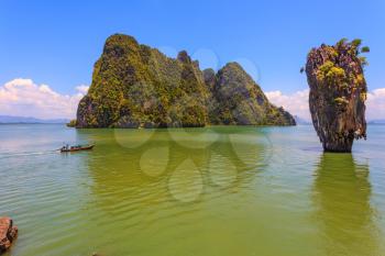 Fine rest in Thailand by native boats. The gulf in the Andaman Sea. James Bond's island in the form of a vase
