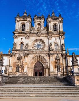 Portugal. Main entrance to the cathedral in Portuguese town of Alcobaca. Built in Baroque style