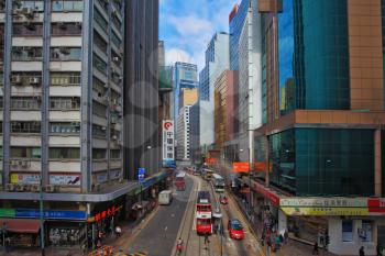 HONG KONG - DECEMBER 11, 2014: Hong Kong Special Administrative Region. Ultra-modern skyscrapers and narrow streets between them