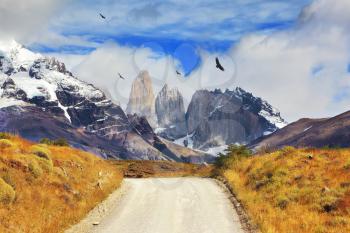 Dirt road to the famous Torres del Paine rocks. National Park in southern Chile