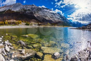 The picturesque Medicine Lake, has strongly shoaled in the fall. Jasper national park, Canada