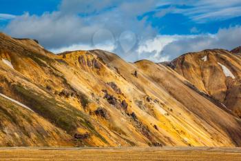 Magnificent Iceland in the summer. Valley National Park Landmannalaugar in the warm sunshine in July