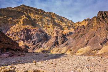 Israel in January. Multi-color and picturesque Black canyon in ancient Eilat mountains