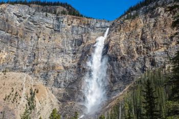 Rocky Mountains of Canada. Yoho National Park. Gorgeous full-flowing waterfall Takakkaw Falls