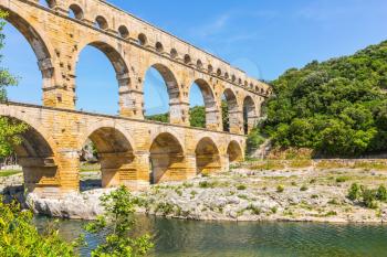 Pont du Gard is the highest-preserved ancient Roman aqueduct. Summer in Provence, sunny day