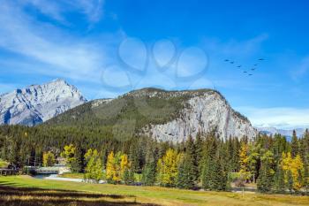 Mountain valley in Banff National Park. The sunny autumn day in the Canadian Rockies