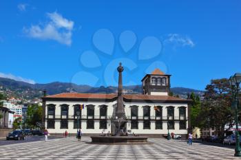 FUNCHAL, MADEIRA - OCTOBER 08, 2011: Before administration building stands a memorial monument. The main square of the city