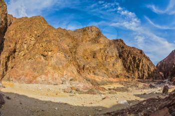 Israeli winter. Picturesque and multi-color Black canyon in ancient Eilat mountains
