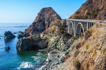 Great arch bridge - viaduct runs along the Pacific coast. California highway number 1. USA